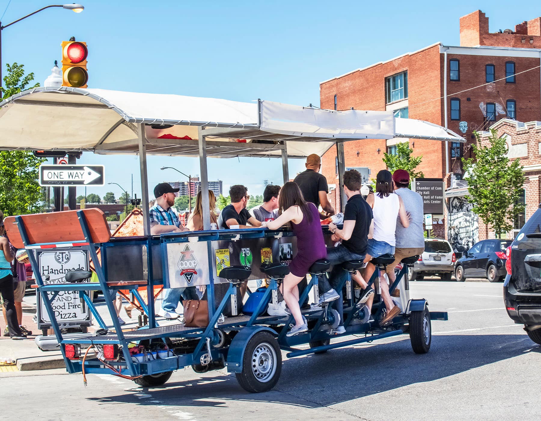 Young group pedaling on the pub crawl